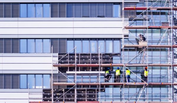 Image of Construction workers on scaffolding